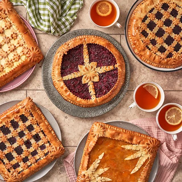 Russian pies with berry, apricot and poppy seed fillings, served with tea